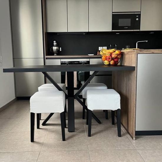 Création d'une table à manger dans un prolongement d'ilot